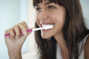 Woman Brushing Her Teethe