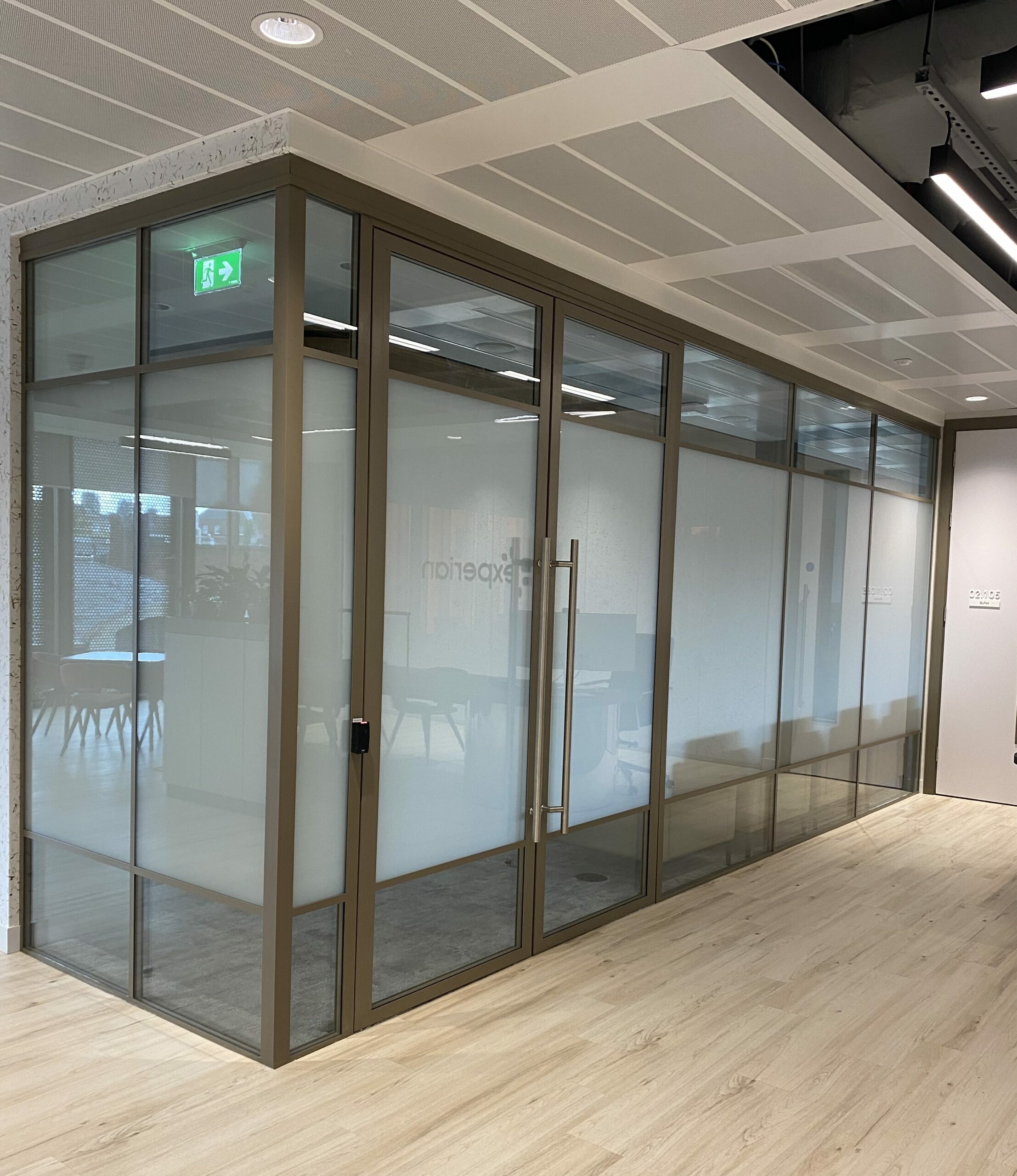 banded switchable glass partitioning in an office meeting room, 'off' position