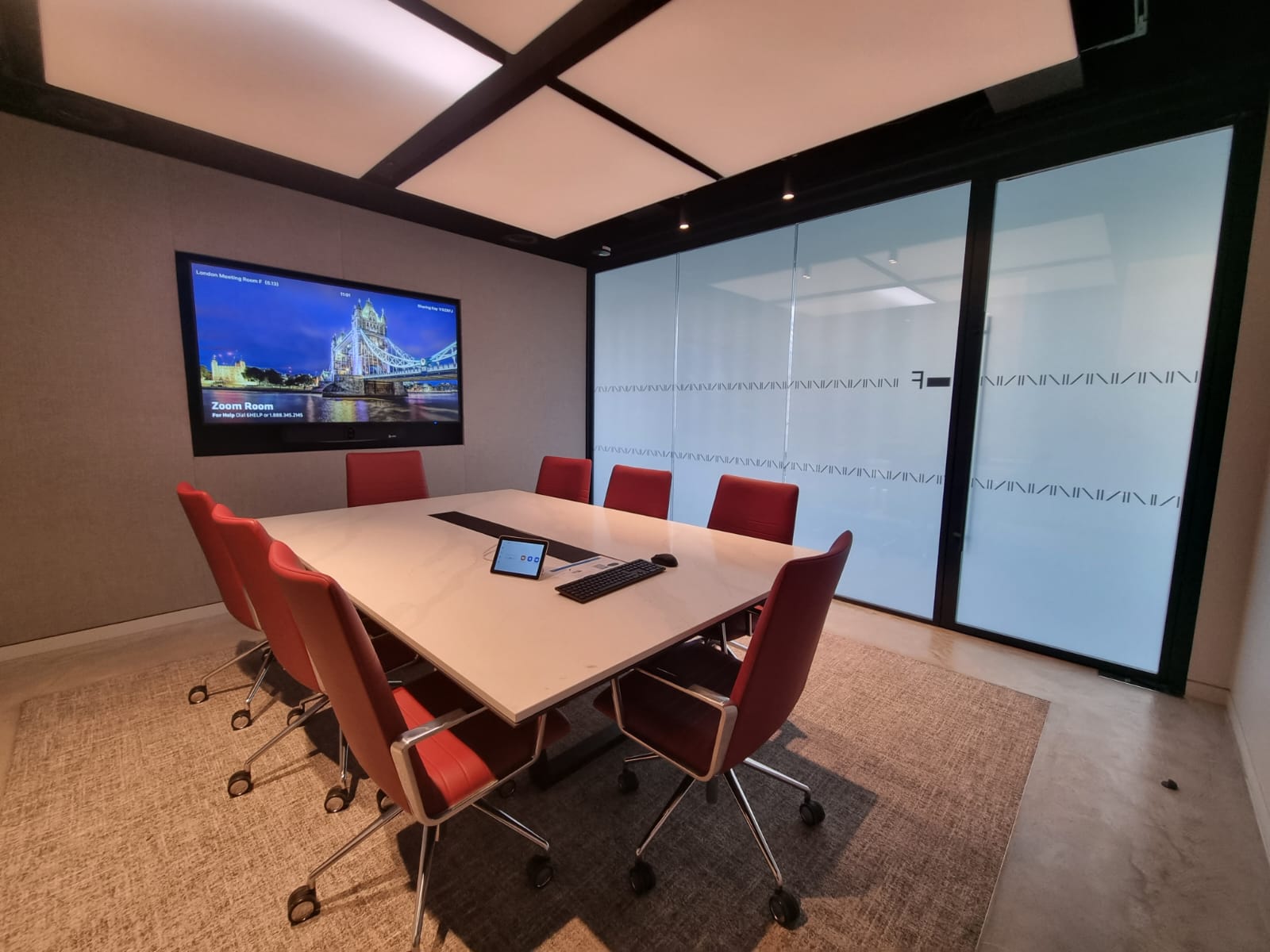 Switchable privacy glass transforms a London office into a stylish open-plan space to maximise natural light.