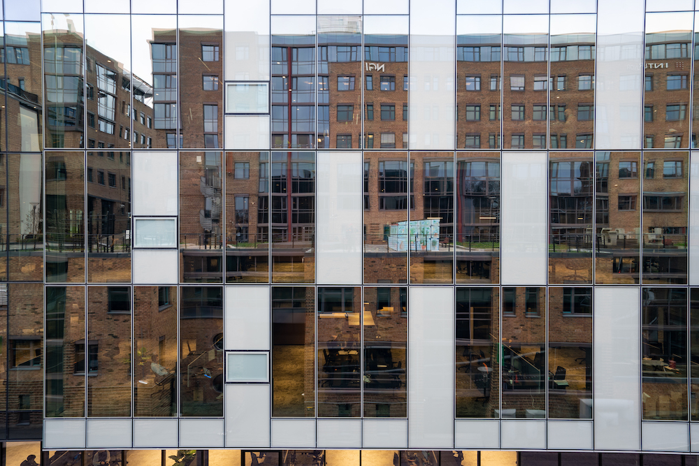 ConverLight by Smartglass at work, in the external-facing windows of this office building. The dynamic smart glass automatically adjusts to make the most of available natural light.